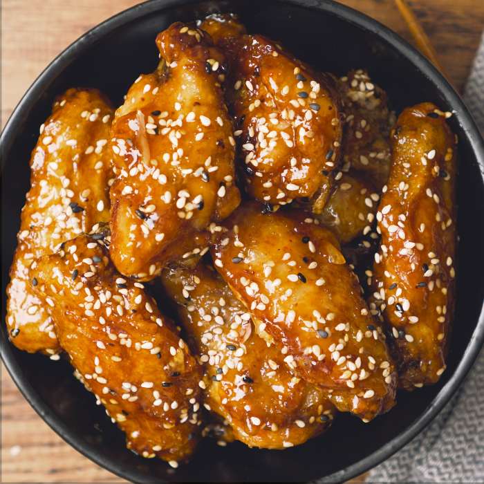 Wings crispy chicken honey garlic sauce fried sweet sticky serving glaze finger make tossed easy ensures licking method stay super